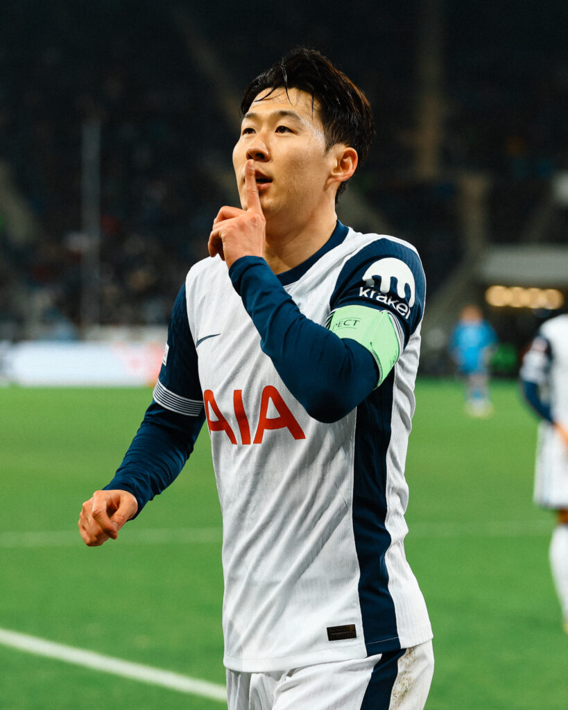 Son's Brace Seals Dramatic Europa Win. 1 Son Celebrating