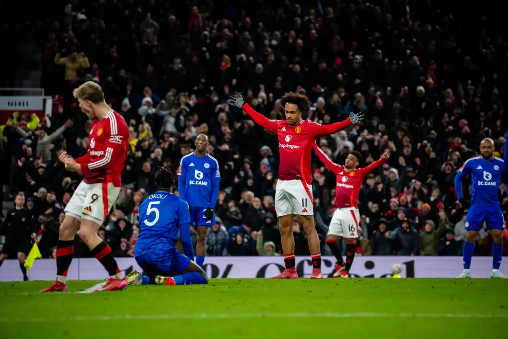 FA Cup Drama: Harry Maguire's Controversial Offside Goal Seals Manchester United's 2 - 1 Victory Over Leicester City 1 Manchester United players celebrate
