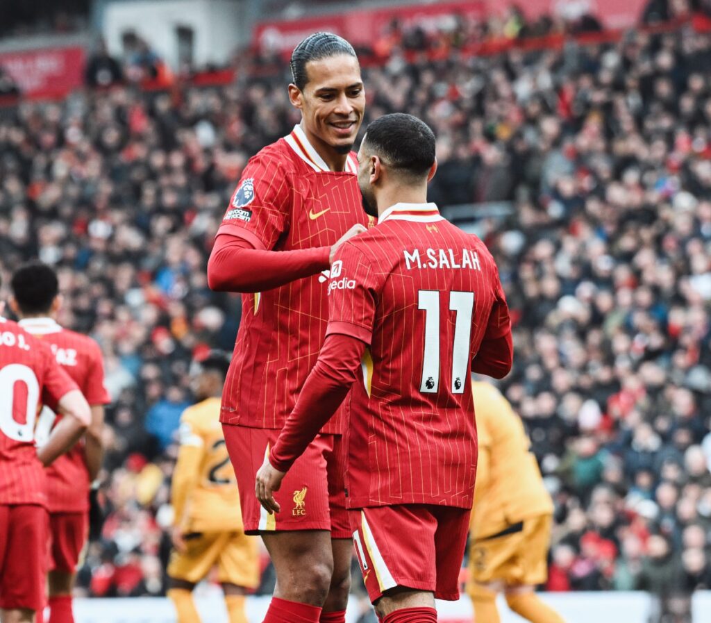 Liverpool's Gritty Victory Over Wolves: Diaz and Salah Shine as Reds Extend Premier League Lead to 7 Points 3 Van Dijk and Salah Celebrating against Wolves