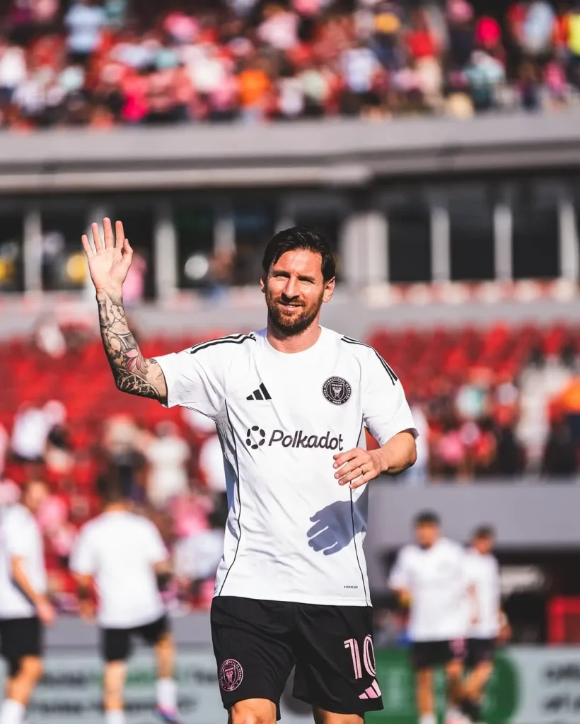Lionel Messi's Humble Take on the GOAT Debate Post-World Cup and Ballon d'Or Glory 1 Messi The GOAT Waving At Fans