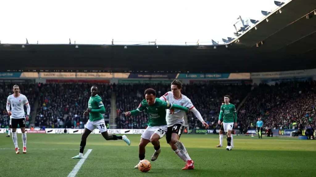 Defeat: Liverpool Crashes Out of FA Cup, A Humiliating Exit to Rock-Bottom Plymouth Argyle 2 Liverpool's Attackers in action