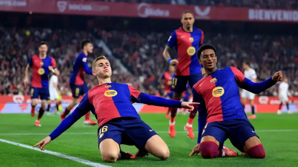 Barcelona's Thrilling 4 - 1 Triumph Over Sevilla: A Rollercoaster Ride of Goals, Drama, and Resilience 1 Barcelona's players celebrates