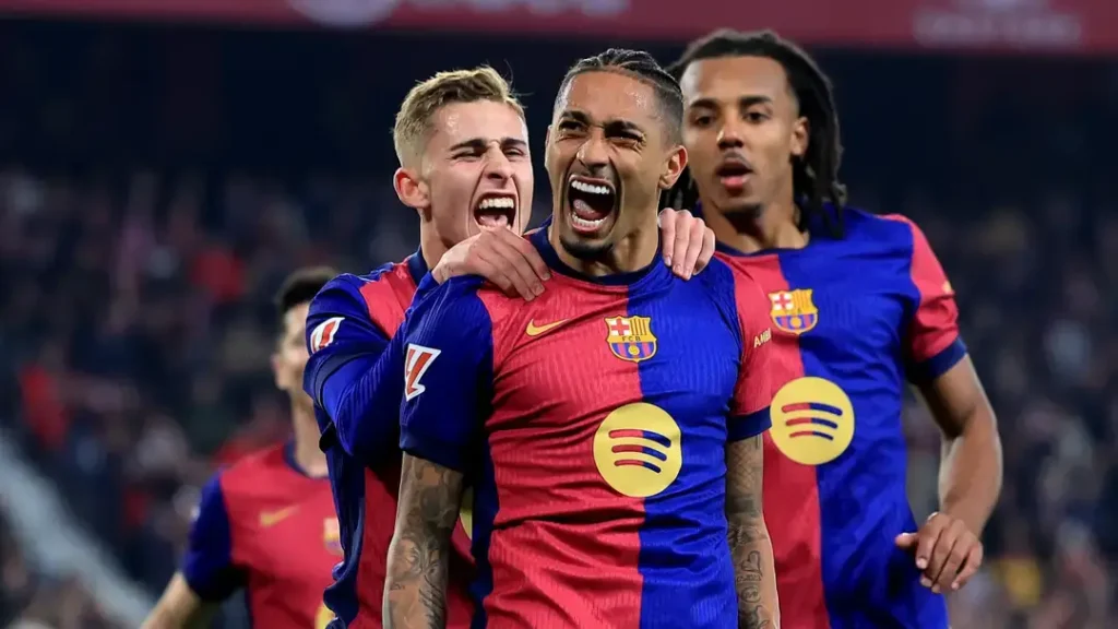 Barcelona's Thrilling 4 - 1 Triumph Over Sevilla: A Rollercoaster Ride of Goals, Drama, and Resilience 3 Raphinha celebrates his goal