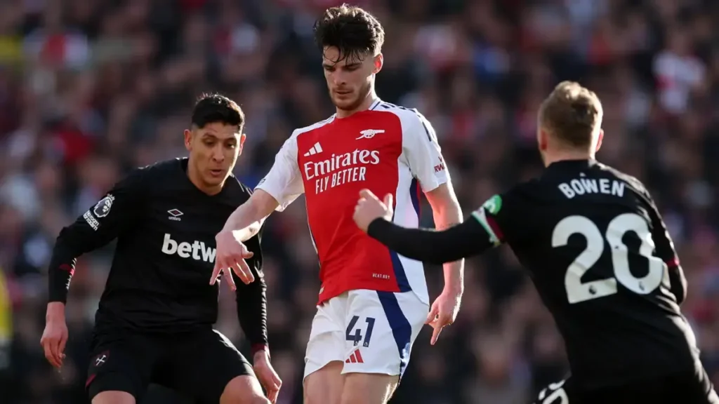 Arsenal's Title Hopes Dented: A Shambolic Display Against West Ham 2 Arsenal's Rice and West Ham players